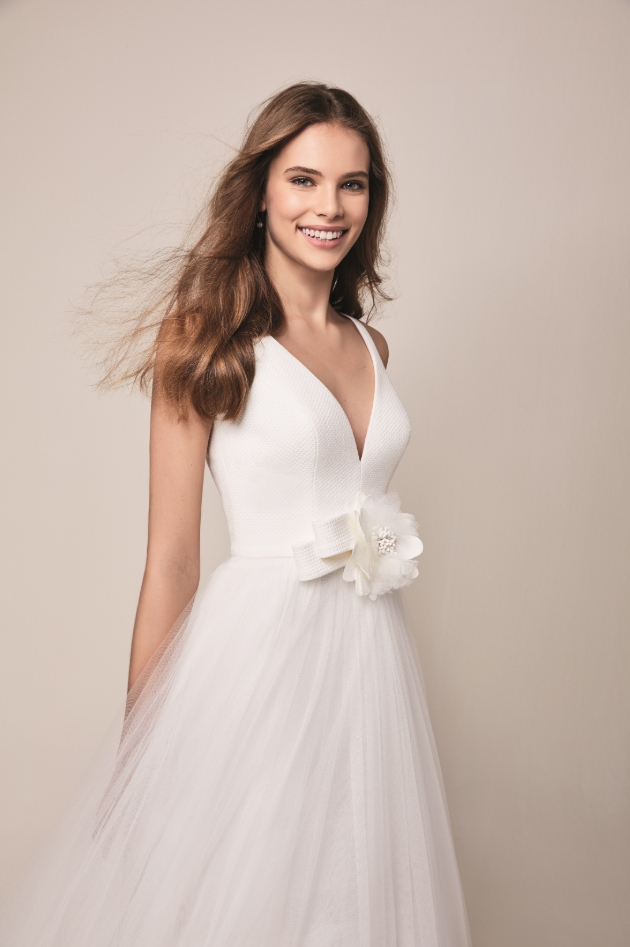 Jesus Peiro wedding dress with large floral detail on the front