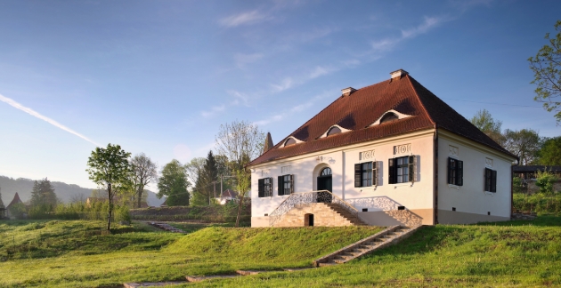 House from Bethelen estate traditional building with steps and grass