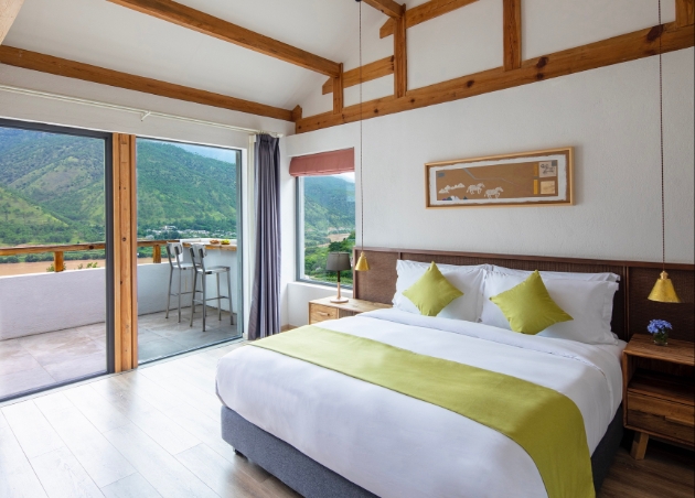 bedroom spacious mountain view through window