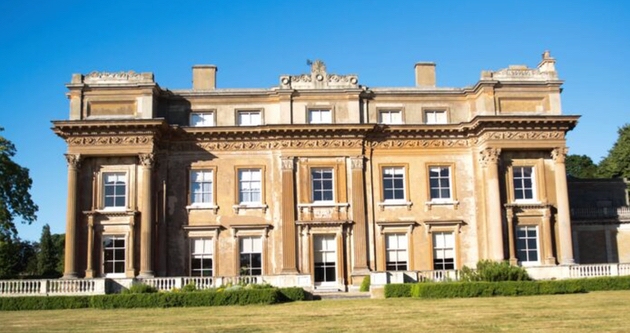 Looking at Turvey House with blue skies