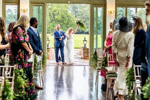 The moment Lucinda walked down the aisle with her dad