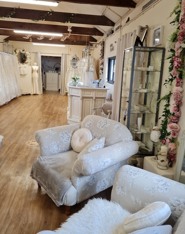 inside the boutique boasting wooden beams and cream chairs