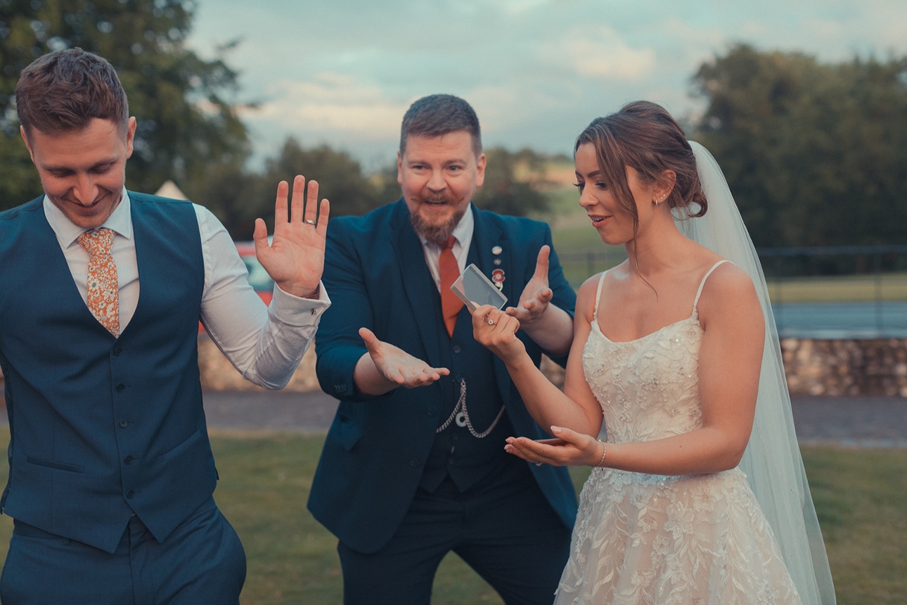 Close-up magic at a wedding with bride and groom