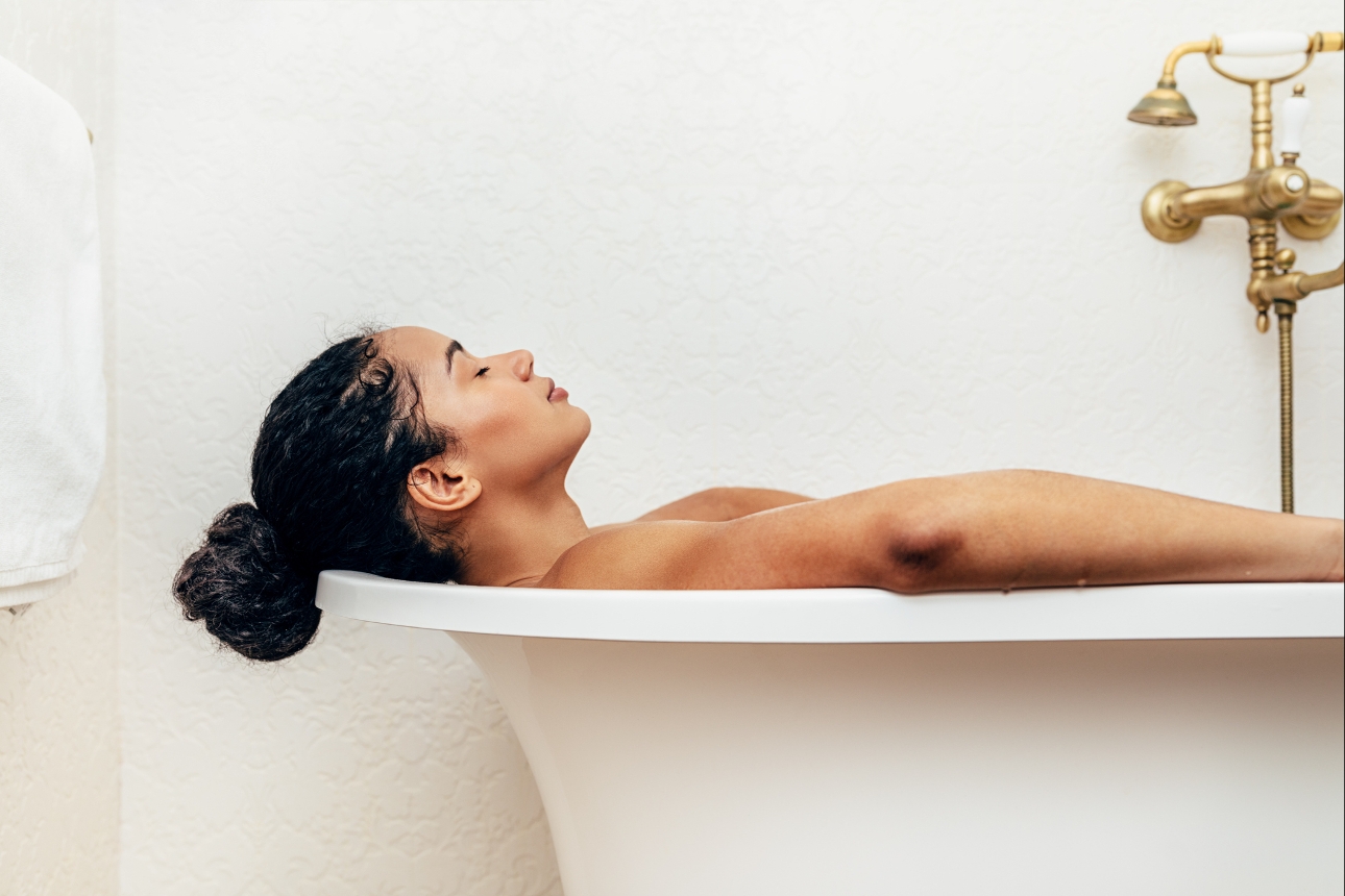 woman relaxing in bath tub