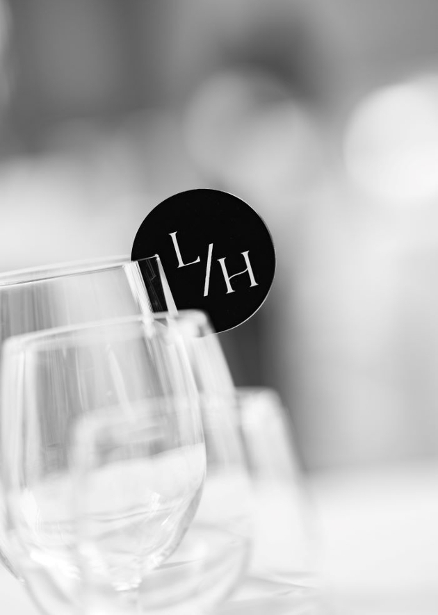 name tag on a wine glass in black and white