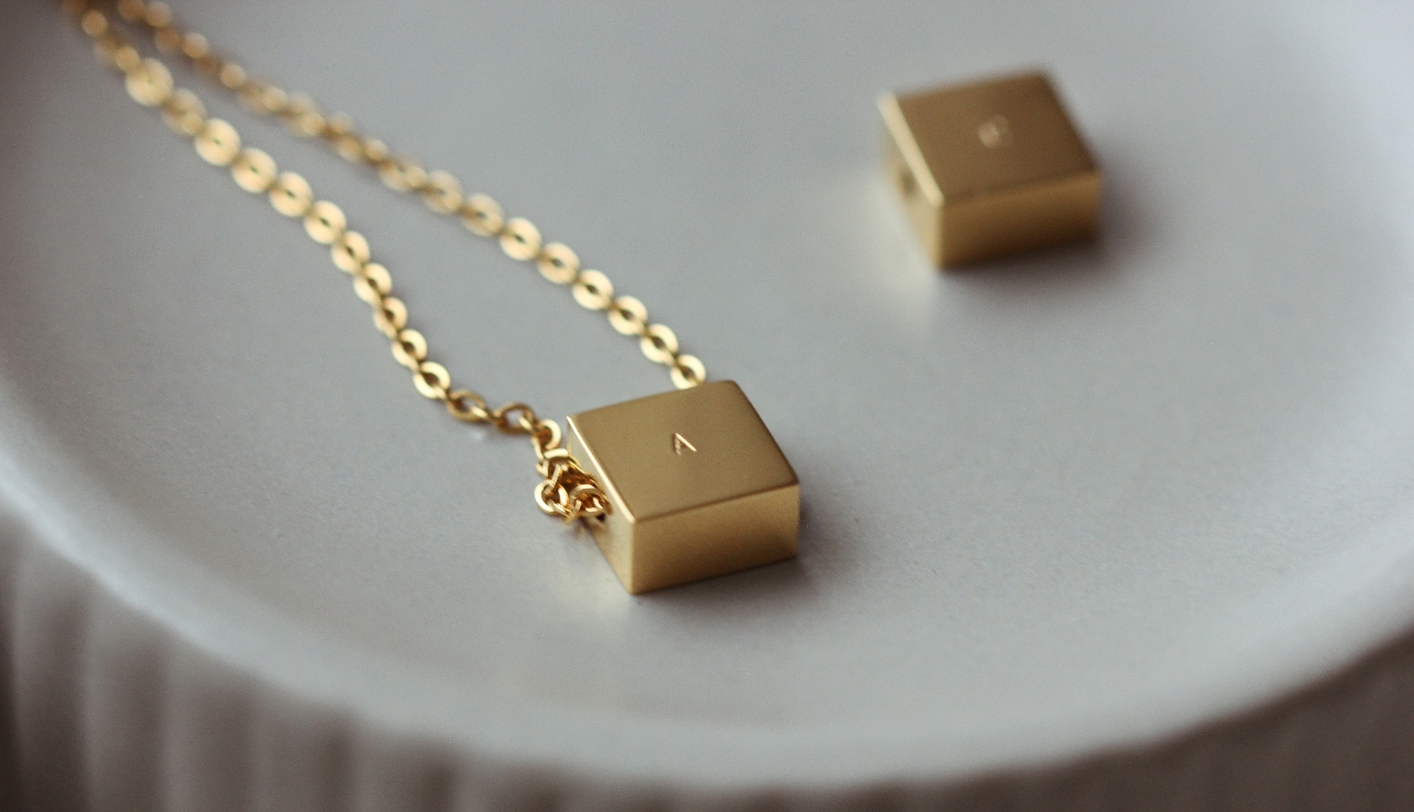 gold cube pendant with initial on
