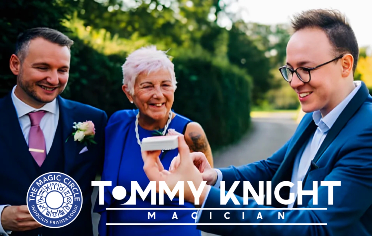 Close-up magic with Tommy Knight and guests at wedding