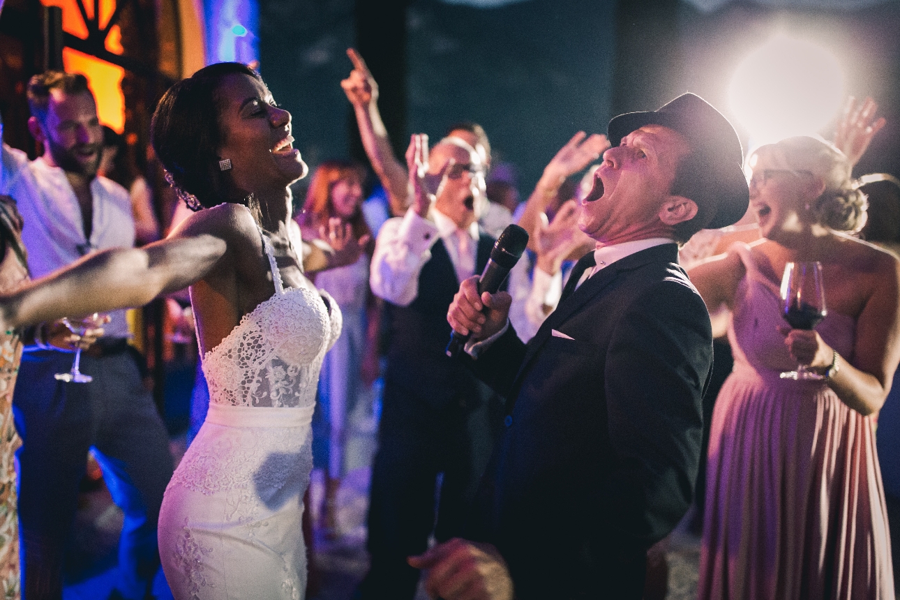 Paul as Sinatra singing to a bride