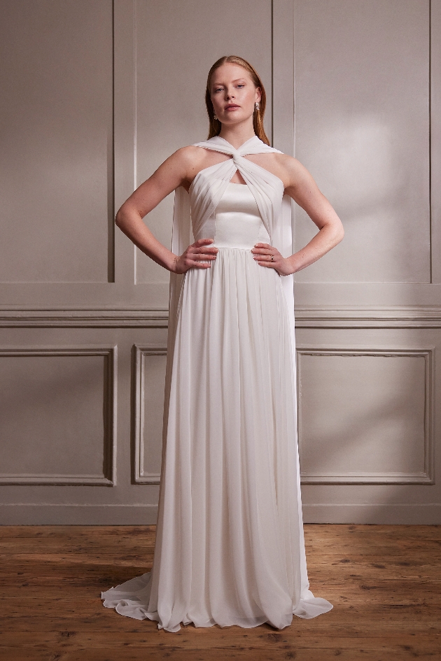 model in Grecian wedding gown with cross necklines