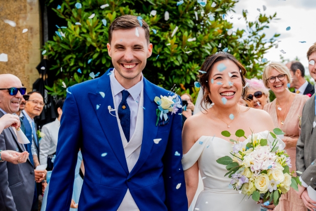Tim Payne capturing a couple’s wedding moments with budget-friendly photography techniques