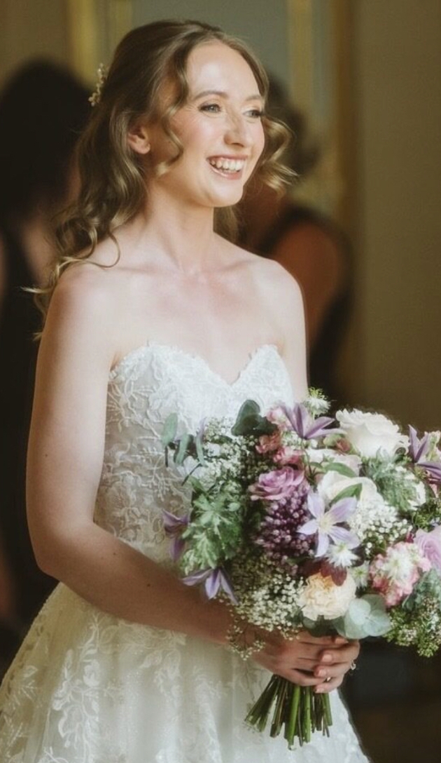 Festive wreath-making workshop by Darling Buds florist featuring seasonal foliage and florals