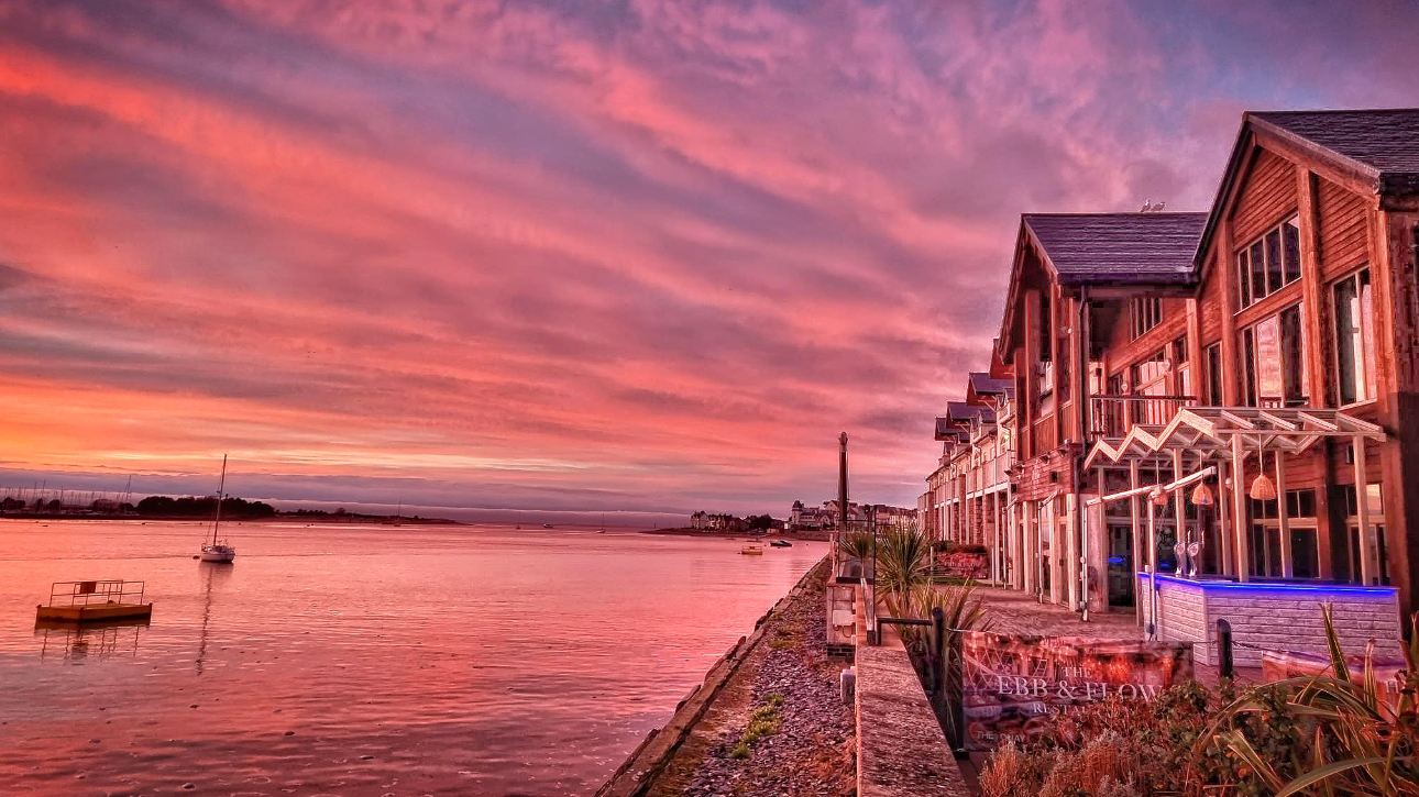 ebb and flow restaurant on coast at sunset